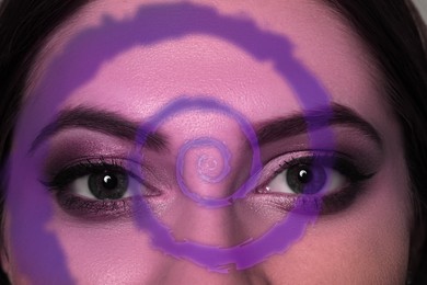 Image of Hypnosis and therapy. Swirl over young woman's face, closeup. Collage design