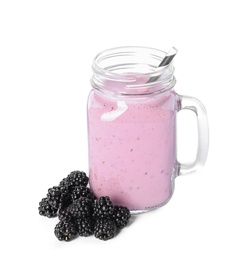 Photo of Tasty fresh milk shake with blackberries on white background