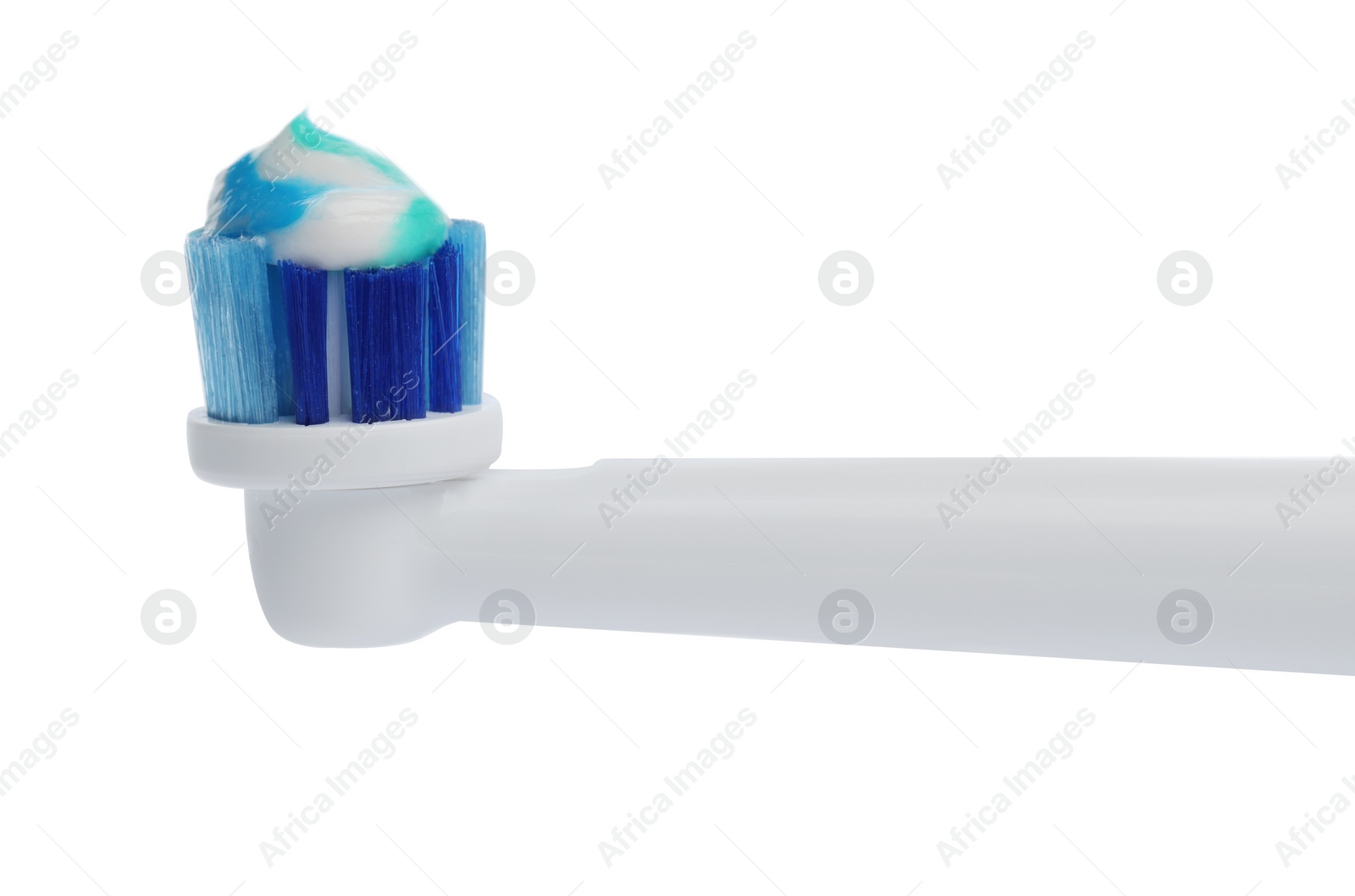 Photo of Electric toothbrush with paste on white background, closeup