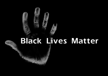 Image of Black Lives Matter. Hand print on dark background