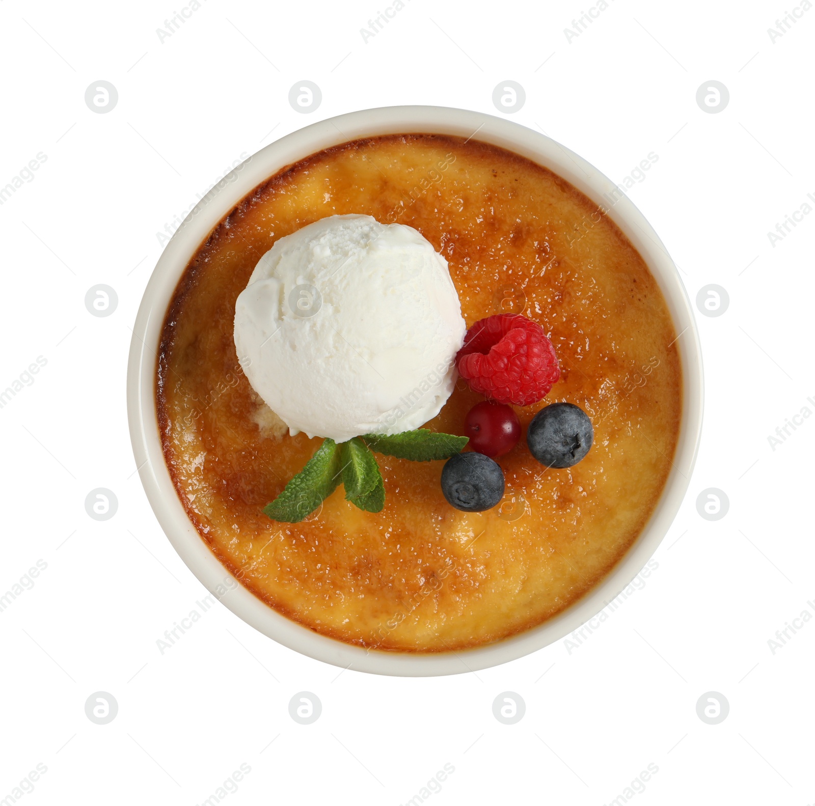 Photo of Delicious creme brulee with scoop of ice cream, fresh berries and mint isolated on white, top view