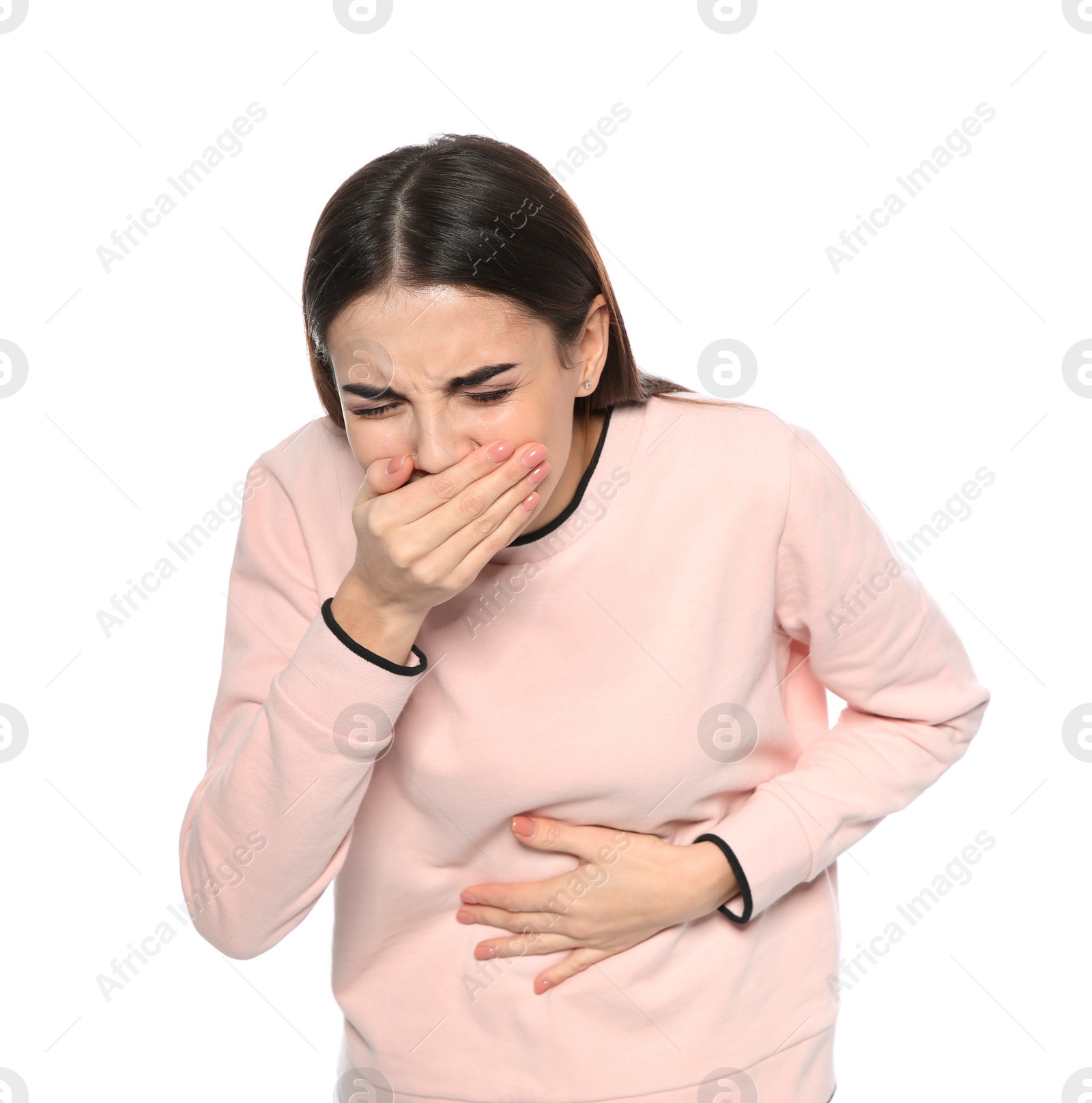 Photo of Young woman suffering from nausea isolated on white