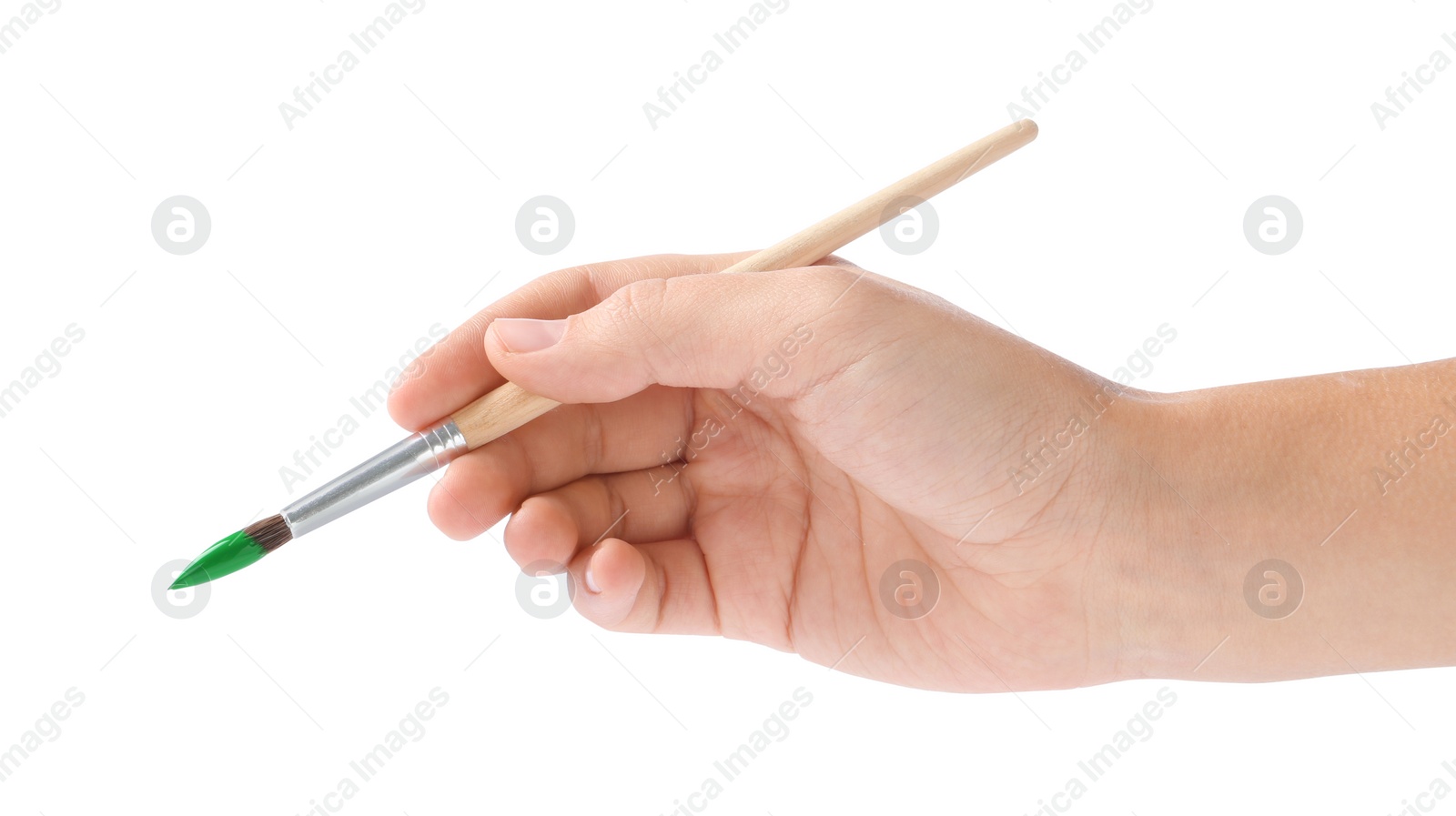 Photo of Young woman holding brush with color paint on white background, closeup