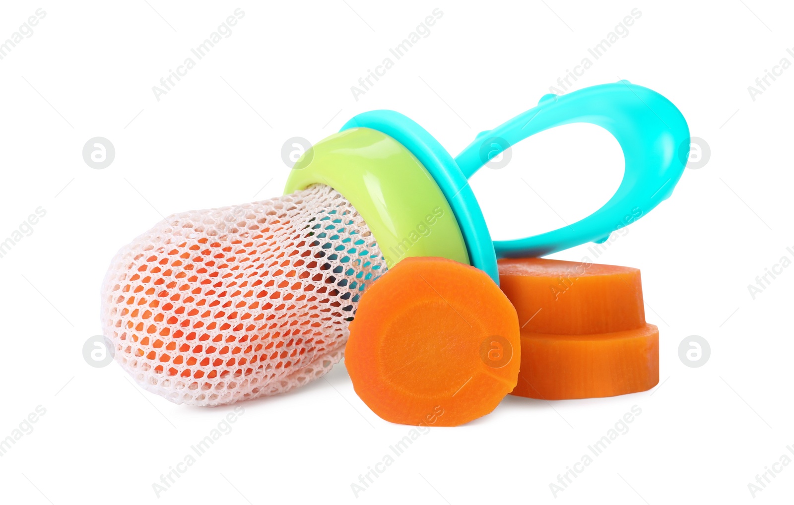 Photo of Nibbler with boiled carrot on white background. Baby feeder