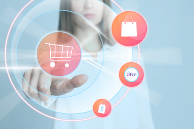 Image of Online shopping. Woman touching button with cart illustration on virtual screen, closeup