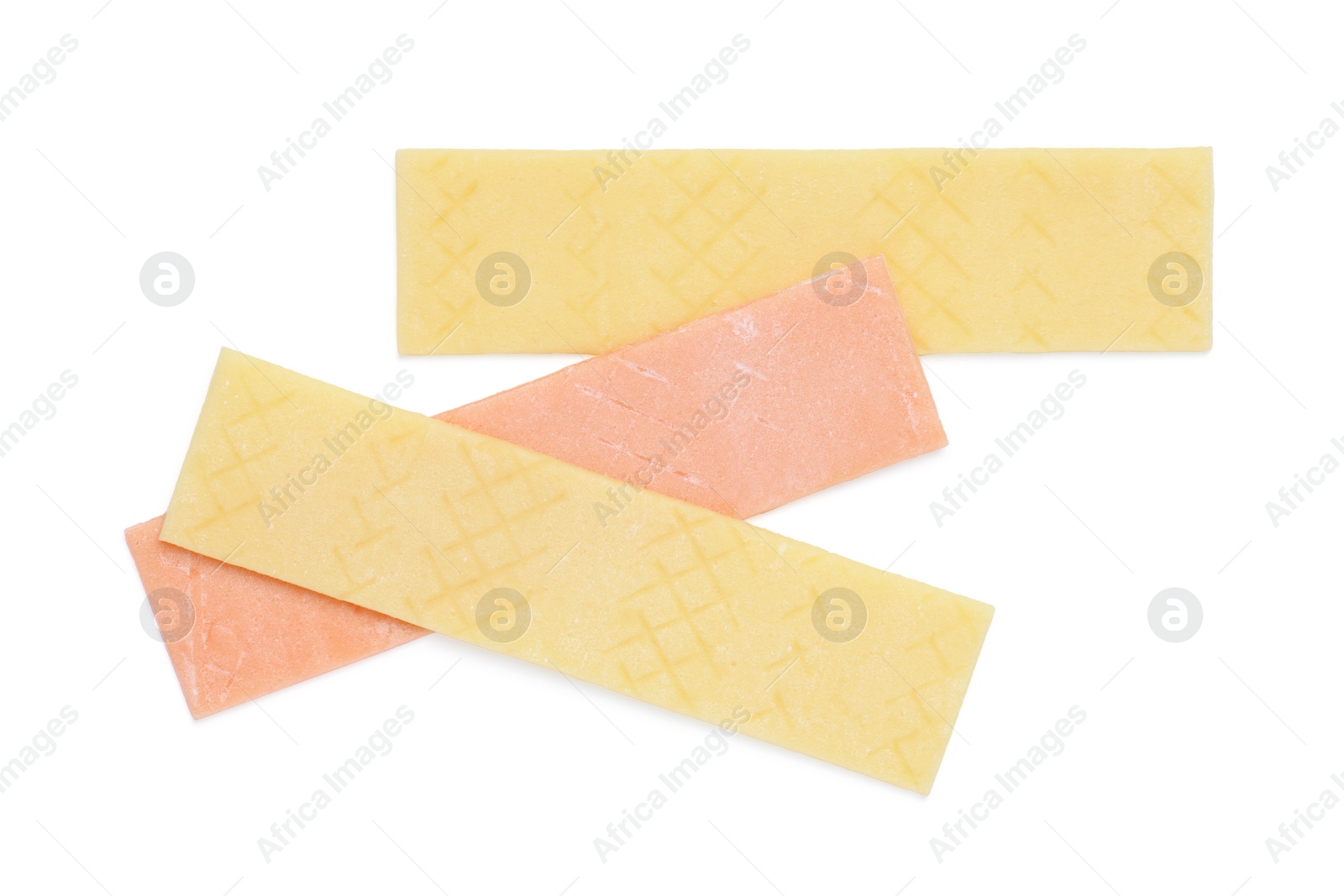 Photo of Sticks of tasty bubble gums isolated on white, top view