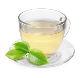 Green tea in glass cup and green leaves isolated on white