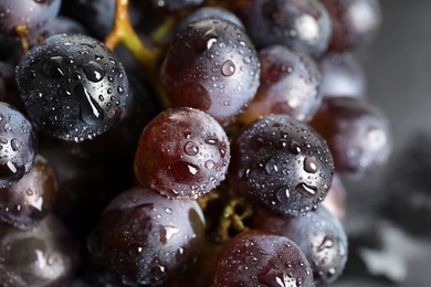 Photo of Bunch of fresh ripe juicy grapes as background, closeup