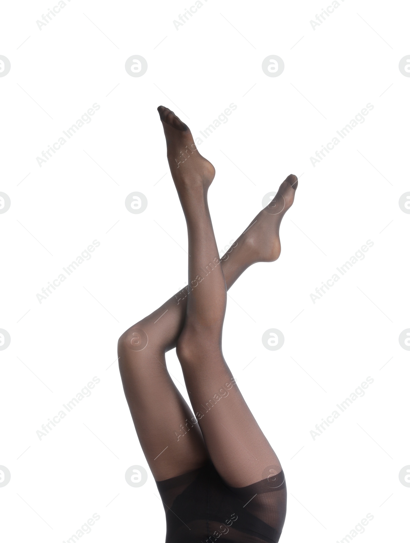 Photo of Woman wearing black tights isolated on white, closeup of legs