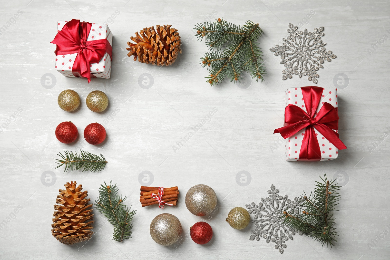 Photo of Flat lay composition with Christmas decor and space for text on light background. Festive winter design