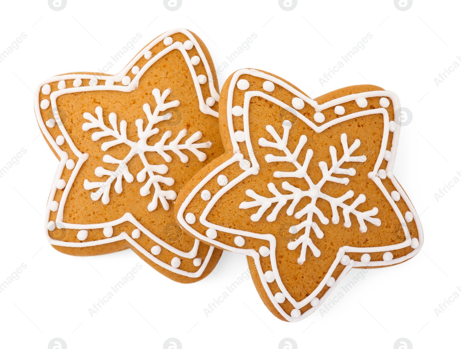 Photo of Tasty star shaped Christmas cookies with icing isolated on white, top view