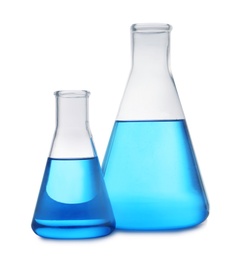 Photo of Conical flasks with blue liquid on white background. Laboratory glassware