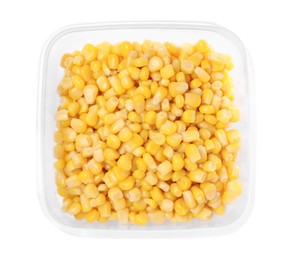 Photo of Fresh corn kernels in plastic container isolated on white, top view