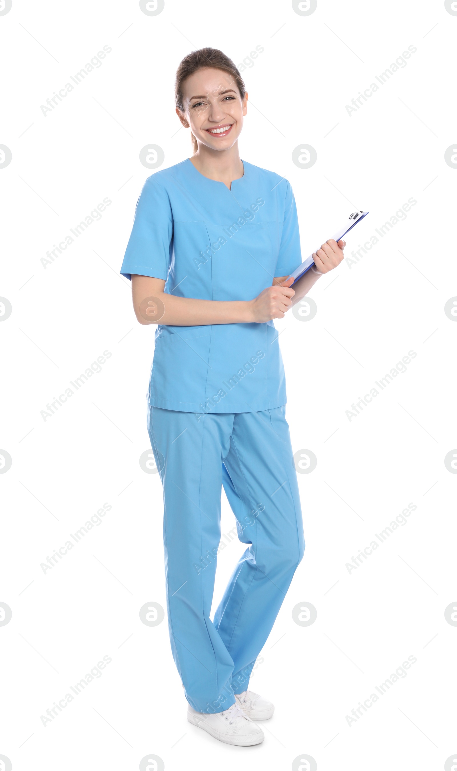 Photo of Full length portrait of medical doctor with clipboard isolated on white