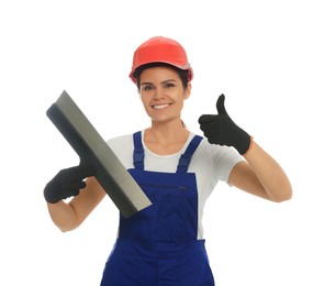 Professional worker with putty knife in hard hat on white background