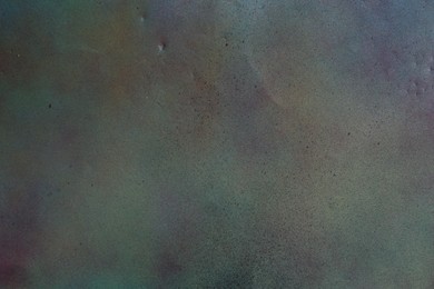 Photo of Texture of abstract spray paint as background, top view