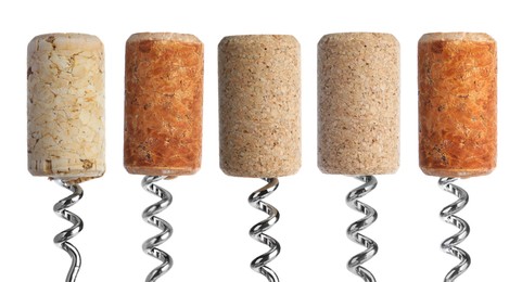 Image of Corkscrews with wine corks on white background