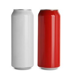 Photo of Aluminum cans with drinks on white background