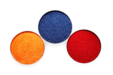 Many different food coloring on white background, top view