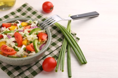 Tasty salad with Chinese cabbage served on white wooden table. Space for text