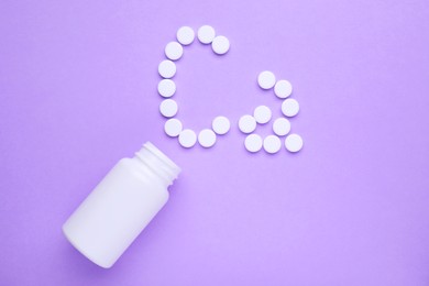 Photo of Symbol Ca (Calcium) made of pills and medical bottle on violet background, top view