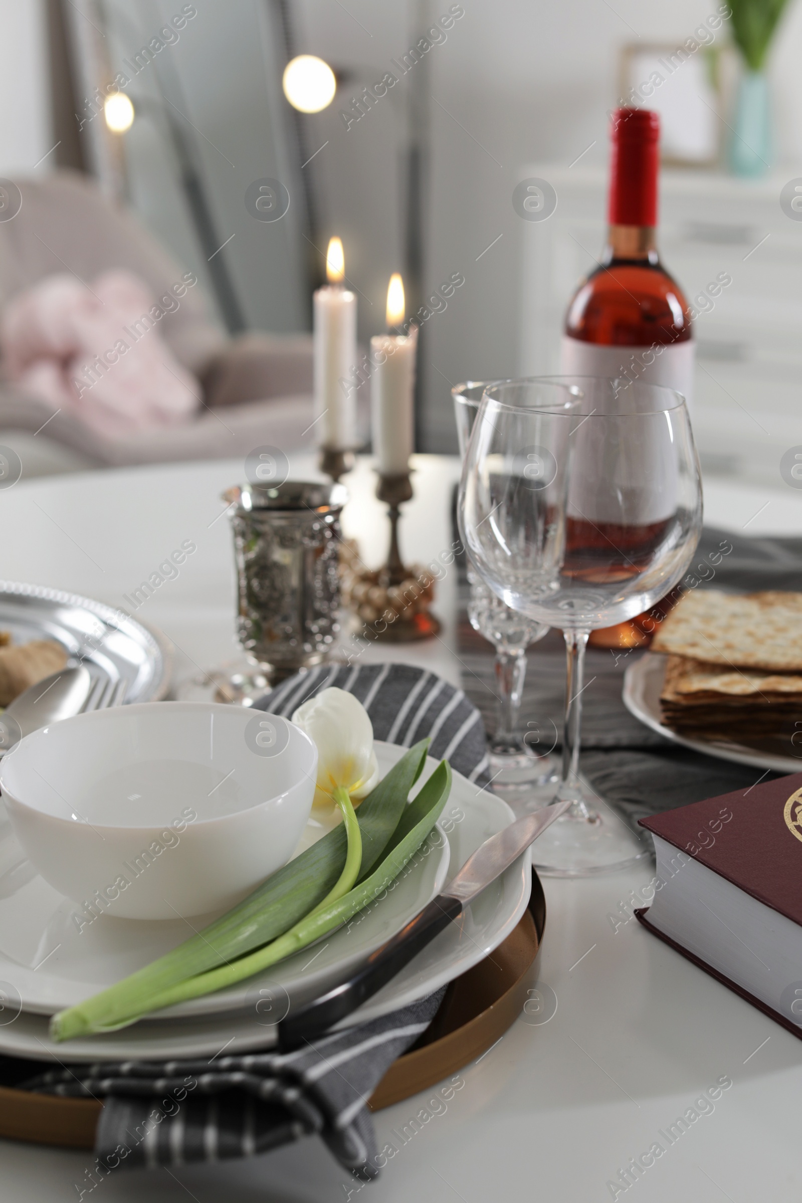 Photo of Festive Passover table setting at home. Pesach celebration