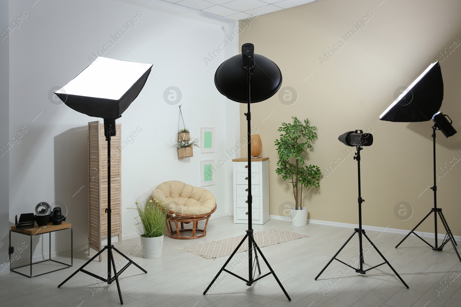 Photo of Example of living room interior design and professional equipment in photo studio