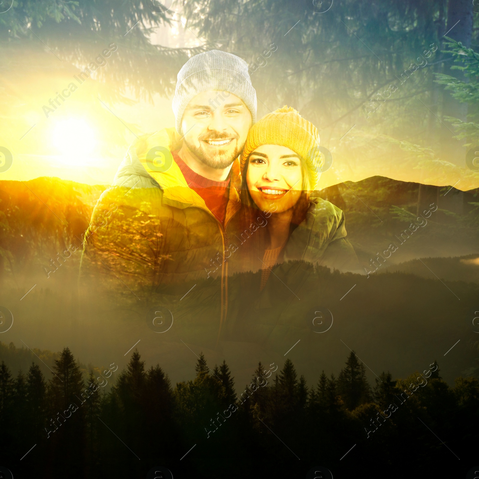 Image of Double exposure of happy couple, sun, mountains and trees