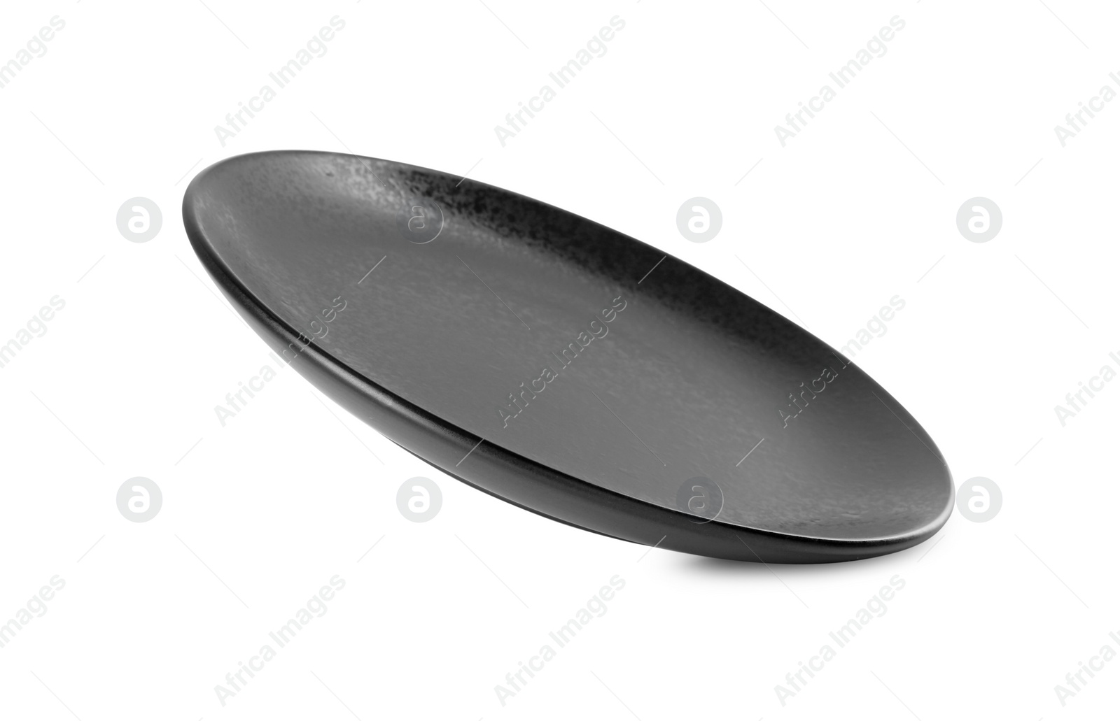 Photo of One beautiful black plate isolated on white