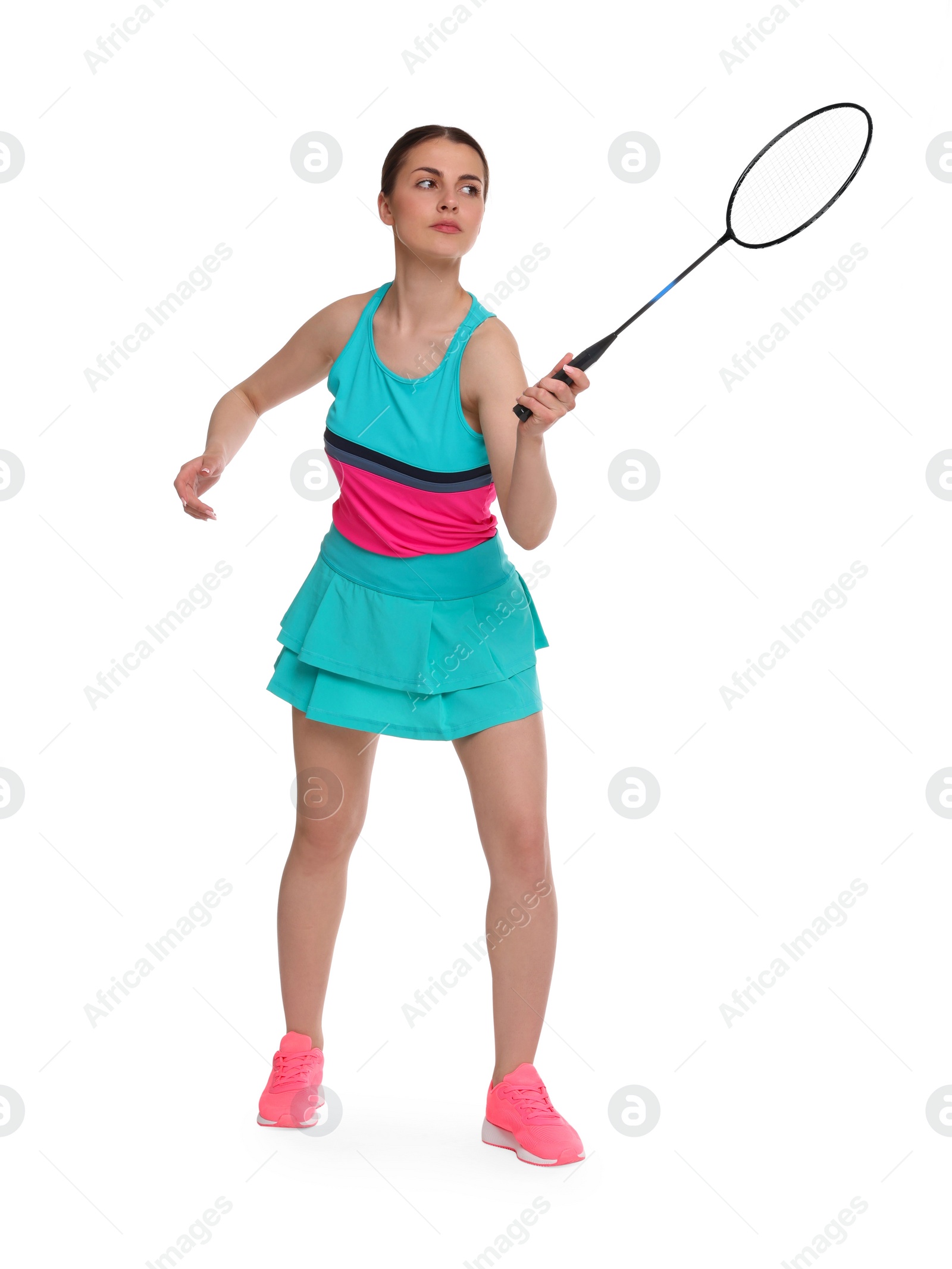 Photo of Young woman playing badminton with racket on white background