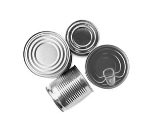 Many closed tin cans isolated on white, top view