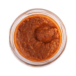 Open jar with butternut squash spread on white background, top view. Pickled food