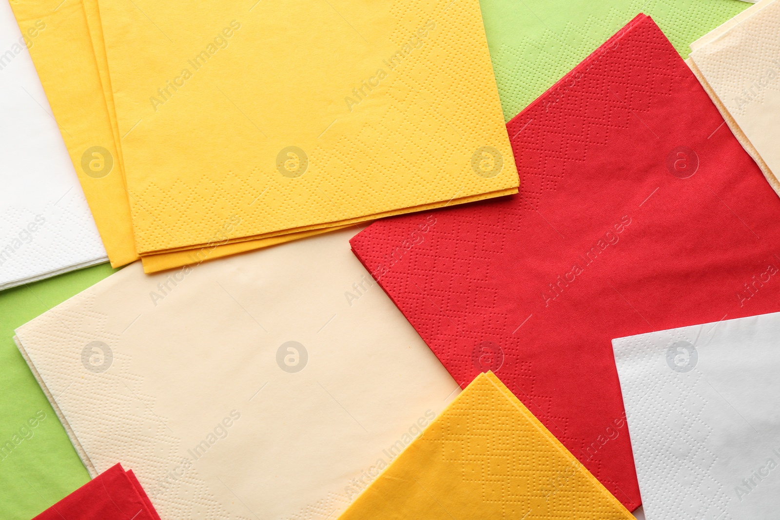 Photo of Clean paper napkins as background, top view. Personal hygiene