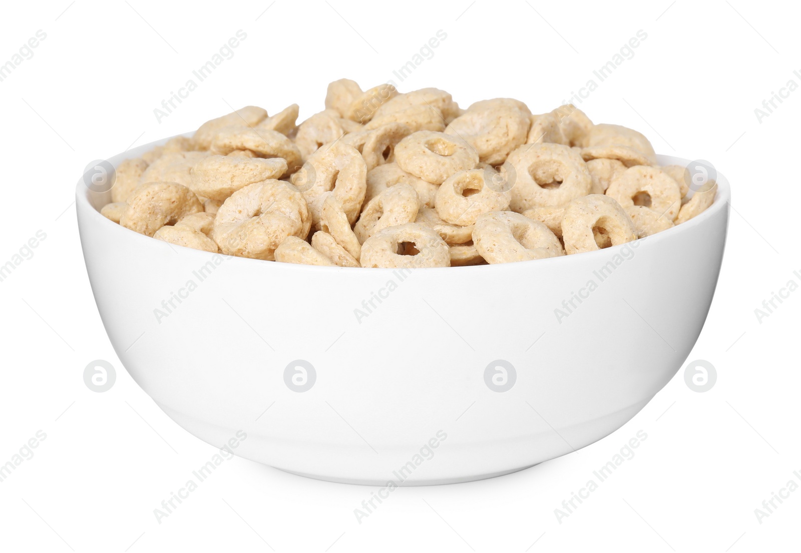 Photo of Tasty cereal rings in bowl isolated on white