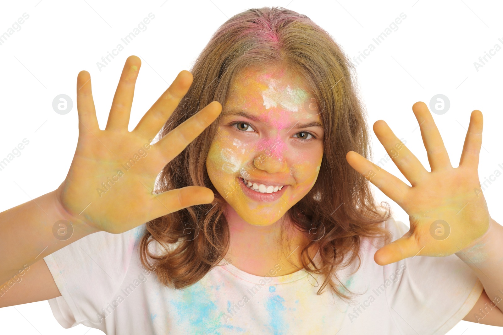 Photo of Teen girl covered with colorful powder dyes on white background. Holi festival celebration