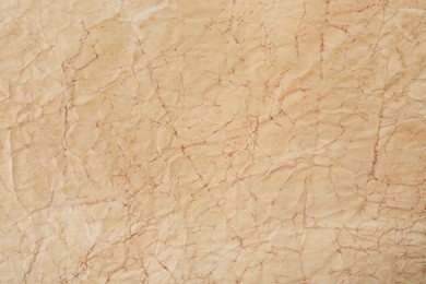 Photo of Sheet of parchment paper as background, top view