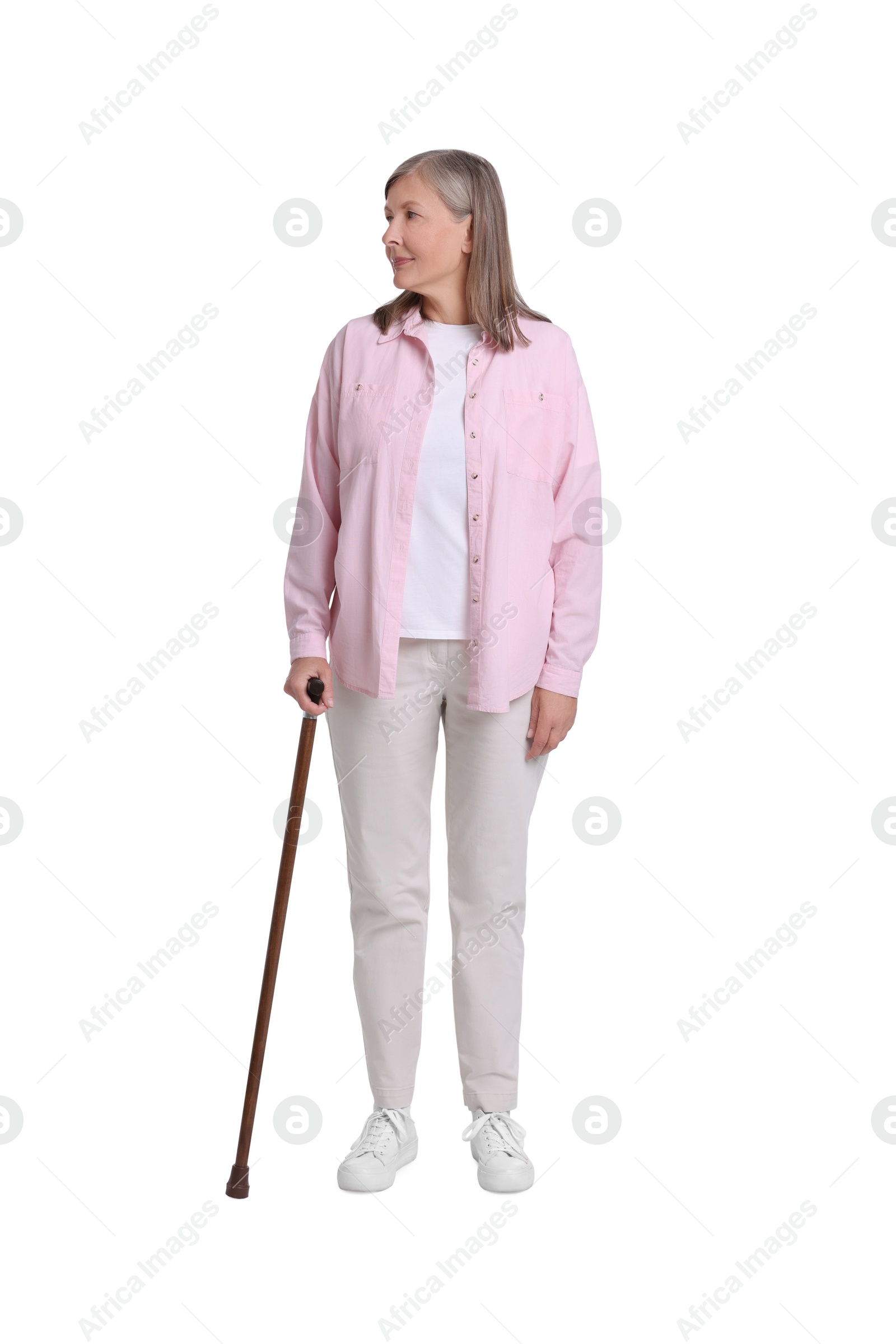 Photo of Senior woman with walking cane on white background