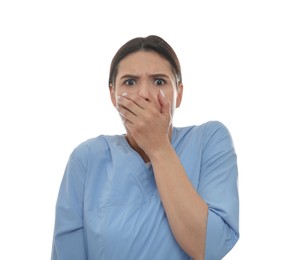 Portrait of nurse feeling fear on white background