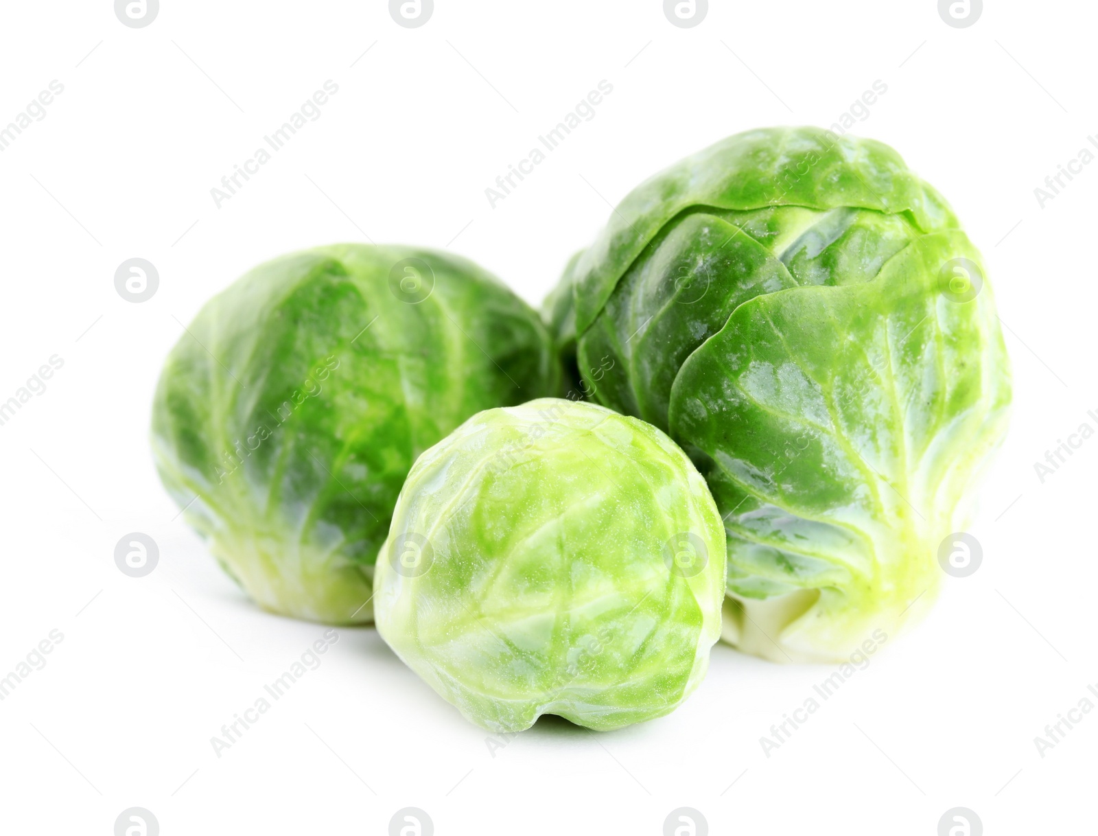 Photo of Fresh tasty Brussels sprouts isolated on white