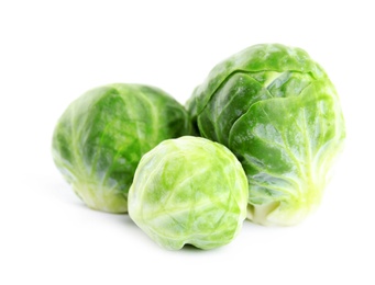 Photo of Fresh tasty Brussels sprouts isolated on white