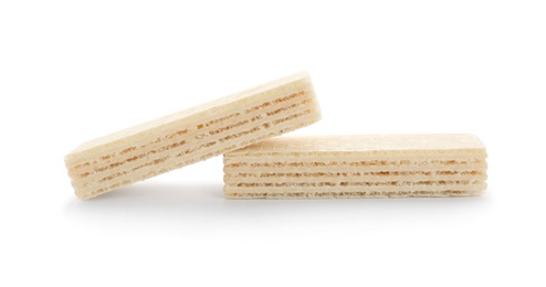 Photo of Delicious crispy wafers on white background. Sweet food