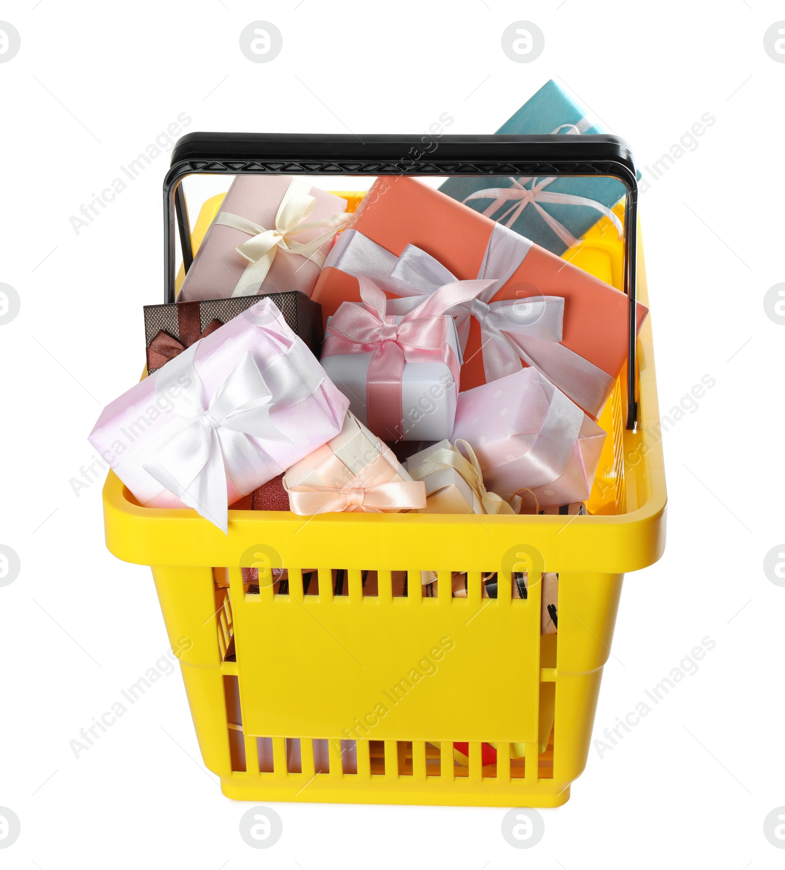 Photo of Shopping basket full of gift boxes on white background