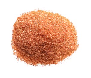 Photo of Heap of orange salt on white background, top view