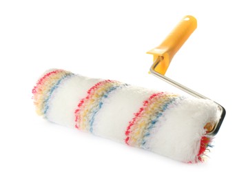 Photo of New paint roller brush on white background