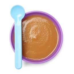 Photo of Delicious baby food in bowl and spoon isolated on white, top view