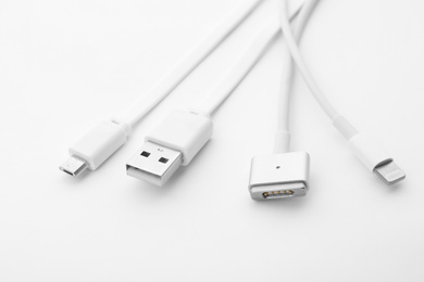 Charge cables on white background. Modern technology