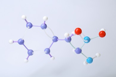 Photo of Molecule of phenylalanine on white background. Chemical model