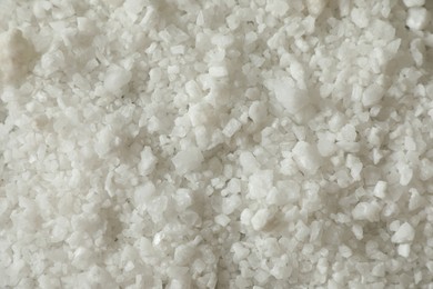 Photo of Organic sea salt as background, top view