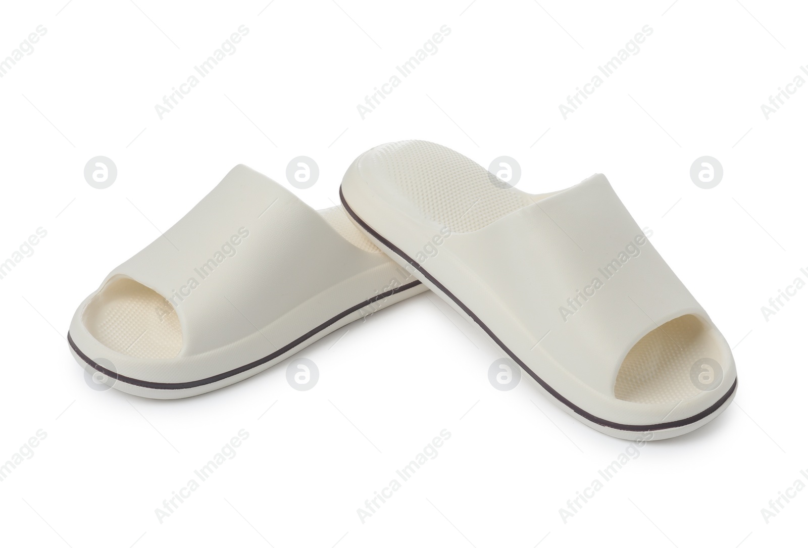 Photo of Pair of rubber slippers isolated on white