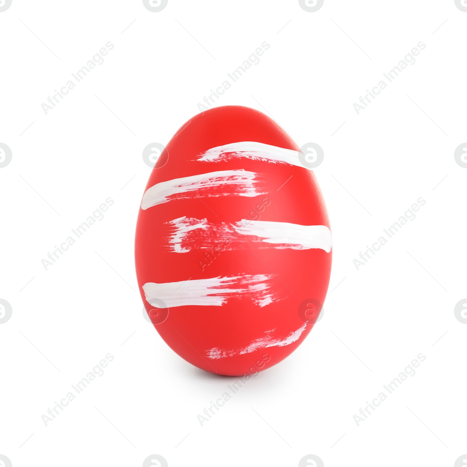 Photo of Creative painted red Easter egg on white background